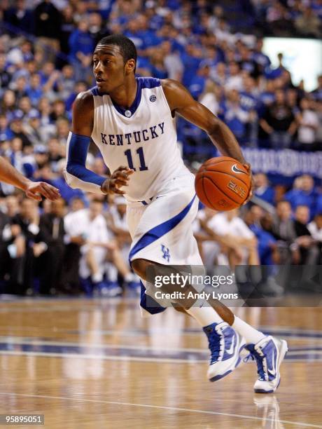 John Wall of the Kentucky Wildcats dribbles the ball during the game against the Hartford Hawks at Rupp Arena on December 29, 2009 in Lexington,...