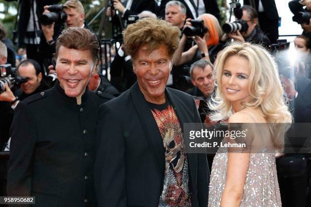 Grichka Bogdanoff, Igor Bogdanoff and Julie Jardon at work at the Solo: "A Star Wars Story" premiere during the 71st Cannes Film Festival at the...