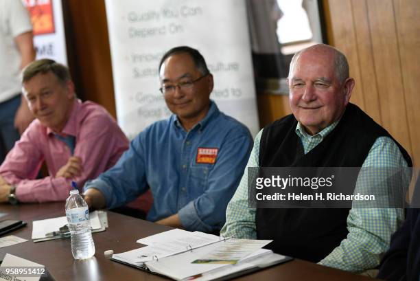 United States Secretary of Agriculture Sonny Perdue, right, seated next to Sakata Farms owner Robert Sakata, middle and Colorado Governor John...