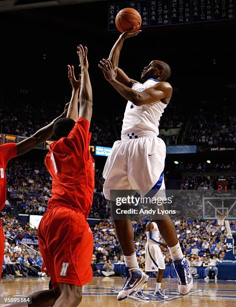 Darius Miller#1 of the Kentucky Wildcats shoots the ball during the game against the Hartford Hawks at Rupp Arena on December 29, 2009 in Lexington,...