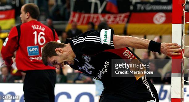 Michael Haass of Germany celebrates during the Men's Handball European Championship Group C match between Slovenia and Germany at the Olympia Hall on...