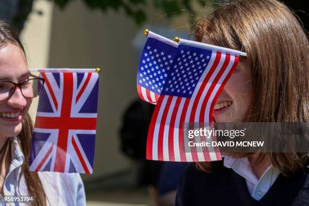 Students at Immaculate Heart High School and Middle school celebrate with US and British flags during a program to honor alumna Meghan Markle, who is...