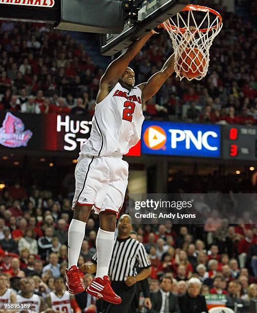 Preston Knowles of the Louisville Cardinals dunks the ball during the Big East Conference game against the South Florida Bulls on December 30, 2009...