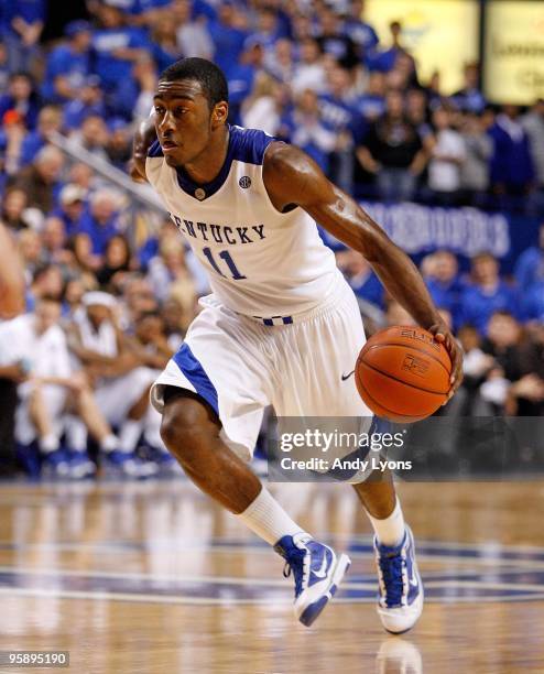 John Wall of the Kentucky Wildcats dribbles the ball during the game against the Hartford Hawks at Rupp Arena on December 29, 2009 in Lexington,...