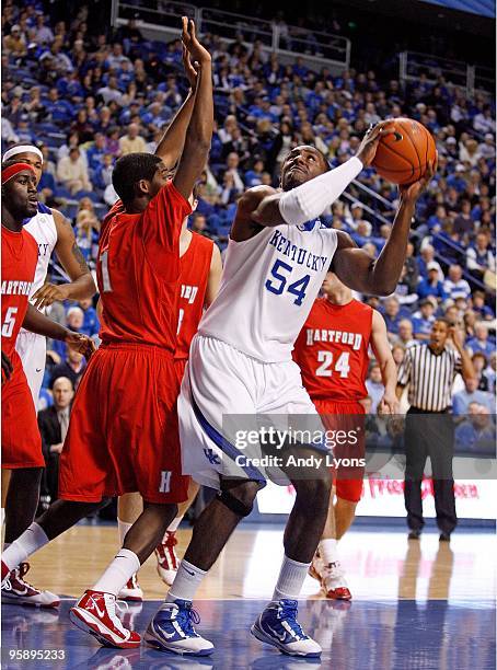 Patrick Patterson of the Kentucky Wildcats shoots the ball during the game against the Hartford Hawks at Rupp Arena on December 29, 2009 in...