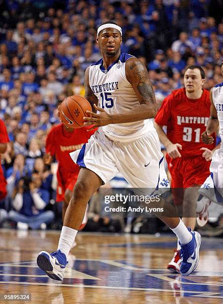 DeMarcus Cousins of the Kentucky Wildcats dribbles the ball during the game against the Hartford Hawks at Rupp Arena on December 29, 2009 in...