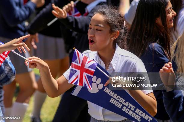 Students at Immaculate Heart High School and Middle school dance and sing with US and British flags during a program on May 15, 2018 in Los Angeles...