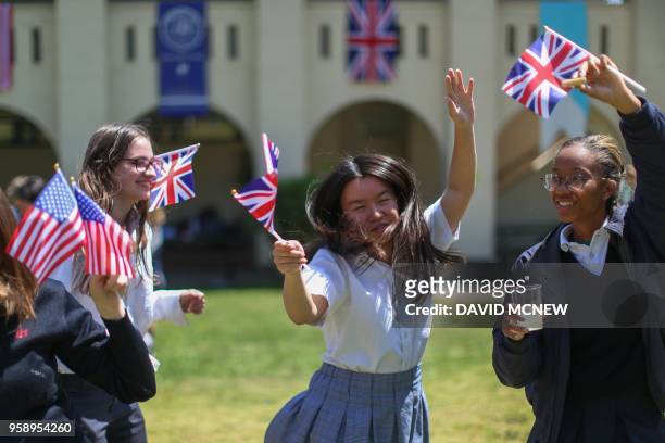 Students at Immaculate Heart High School and Middle school dance and sing with US and British flags during a program on May 15, 2018 in Los Angeles...