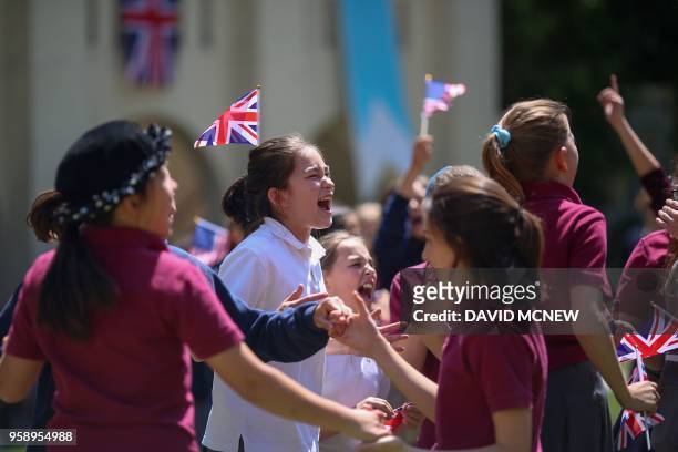 Students at Immaculate Heart High School and Middle school dance and sing with US.and British flags during a program May 15, 2018 in Los Angeles to...