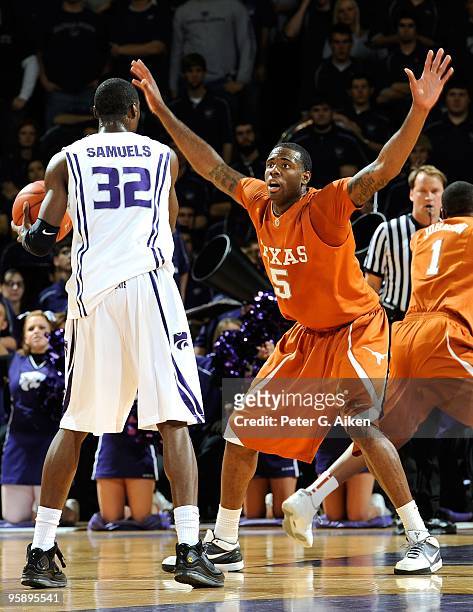 Forward Damion James of the Texas Longhorns defends against forward Jamar Samuels of the Kansas State Wildcats on January 18, 2010 at Bramlage...