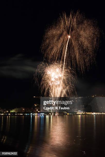 the night of san juan with fireworks in spain - bonfires in the night of san juan stock pictures, royalty-free photos & images