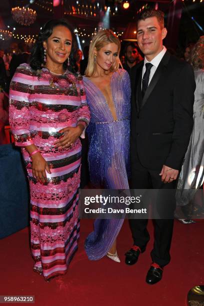 Isabel dos Santos, Paris Hilton and Chris Zylka attend the de Grisogono party during the 71st annual Cannes Film Festival at Villa des Oliviers on...