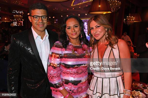 Sindika Dokolo, Isabel dos Santos and Ella Krasner attend the de Grisogono party during the 71st annual Cannes Film Festival at Villa des Oliviers on...