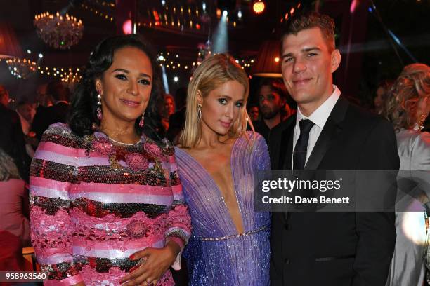 Isabel dos Santos, Paris Hilton and Chris Zylka attend the de Grisogono party during the 71st annual Cannes Film Festival at Villa des Oliviers on...