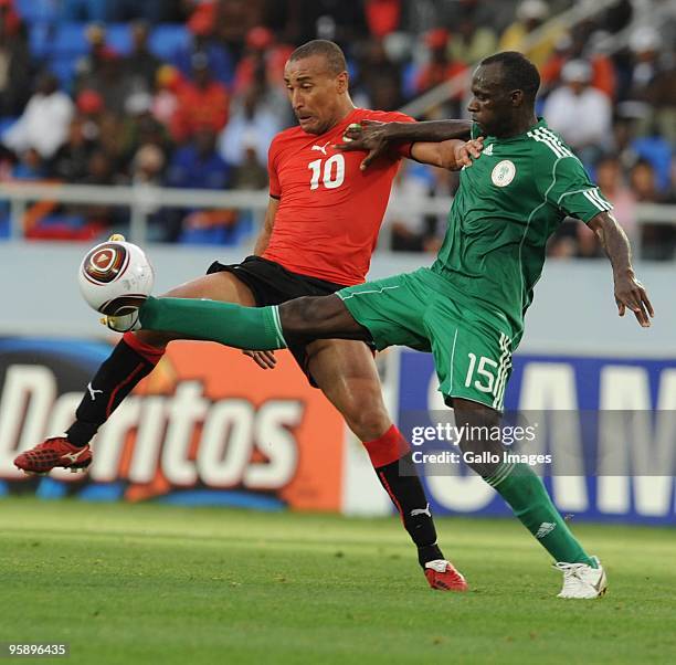 Dario Monteiro of Mozambique and Sani Kaita of Nigeria compete during the African Nations Cup Group C match between Nigeria and Mozambique, at the...