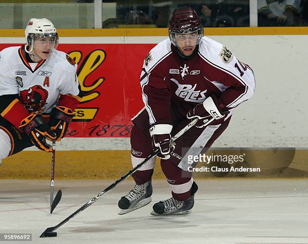 Pat Daley of the Peterborough Petes skates with the puck in a game against the Belleville Bulls on January 14, 2010 at the Peterborough Memorial...