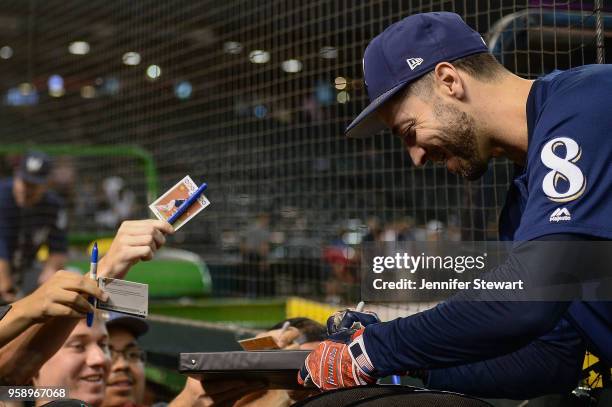 Ryan Braun of the Milwaukee Brewers signs an autograph for fans prior to the MLB game against the Arizona Diamondbacks at Chase Field on May 15, 2018...