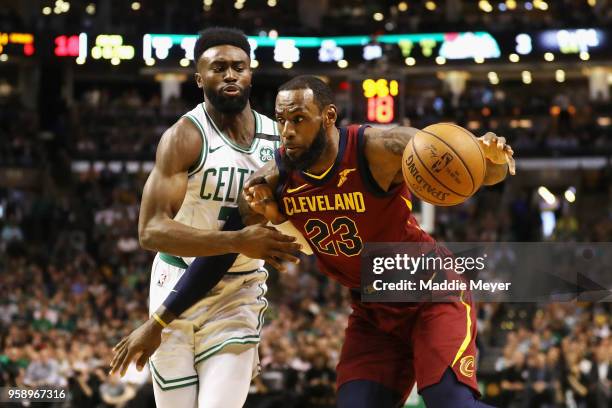 LeBron James of the Cleveland Cavaliers handles the ball against Jaylen Brown of the Boston Celtics in the first half during Game Two of the 2018 NBA...