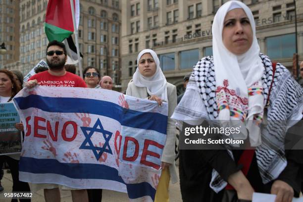 Members of the Palestinian community and their supporters protest President Donald Trump's decision to move the U.S. Embassy in Israel from Tel Aviv...