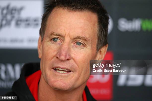 John Worsfold, coach of the Bombers speaks to the media during an Essendon Bombers AFL training session at The Hangar on May 16, 2018 in Melbourne,...