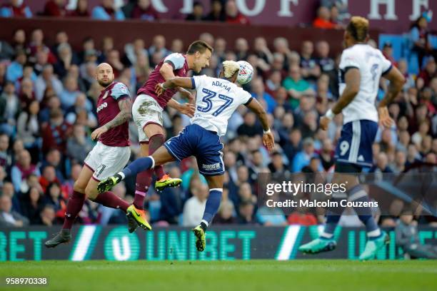 John Terry of Aston Villa heads the ball away from Adama Traore of Middlesbrough during the Sky Bet Championship Play Off Semi Final:Second Leg match...