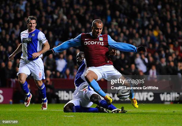 Gabriel Agbonlahor of Aston Villa is fouled for a penalty by Christopher Samba of Blackburn Rovers during the Carling Cup Semi Final 2nd Leg match...