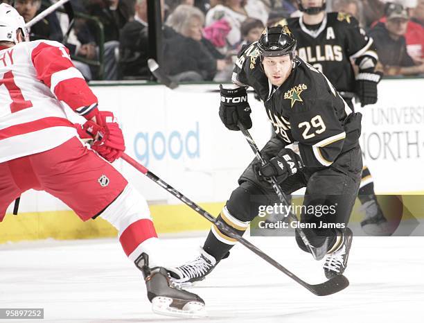 Steve Ott of the Dallas Stars skates against Daniel Cleary of the Detroit Red Wings on January 16, 2010 at the American Airlines Center in Dallas,...