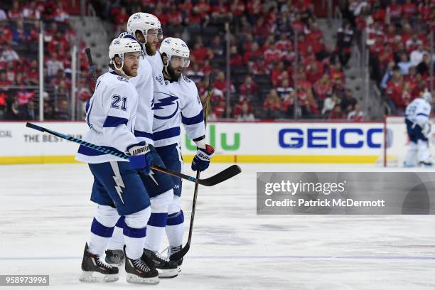 Nikita Kucherov of the Tampa Bay Lightning celebrates with his teammates after scoring a second period goal against the Washington Capitals in Game...