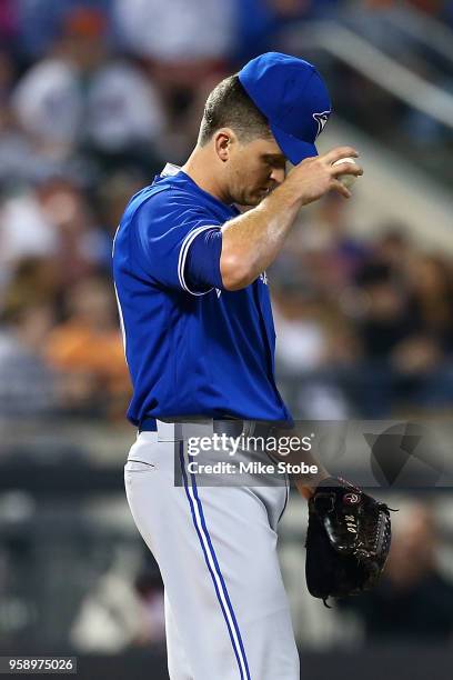 Jake Petricka of the Toronto Blue Jays reacts after giving up a RBI double in the fourth inning to Asdrubal Cabrera of the New York Mets at Citi...