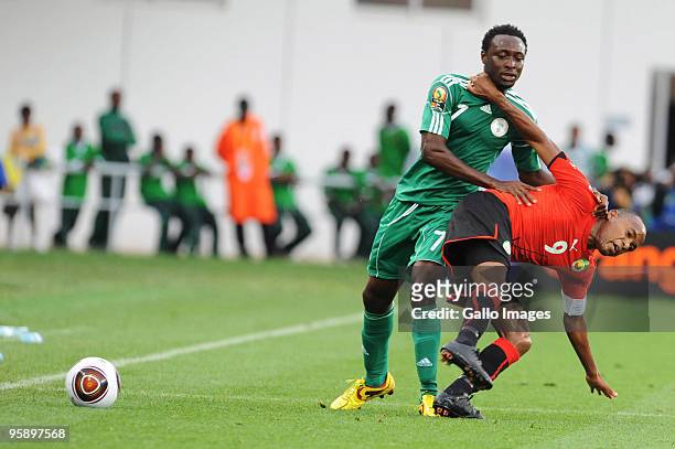 Chinedu Obasi of Nigeria and Tico-Tico Bucuane of Mozambique compete during the African Nations Cup Group C match between Nigeria and Mozambique, at...