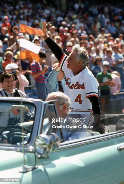 Earl Weaver manager of the Baltimore Orioles waves to the crowd on Earl Weaver Day at Memorial Stadium circa 1983 in Baltimore, Maryland.