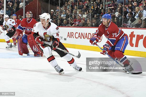 Zach Smith of the Ottawa Senators and Andrei Markov of Montreal Canadiens waits for a pass during the NHL game on January 16, 2010 at the Bell Centre...
