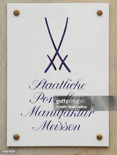 The double-sword logo of German luxury porcelain maker Meissen is visible on a plaque at the Meissen manufactury on January 20, 2010 in Meissen,...