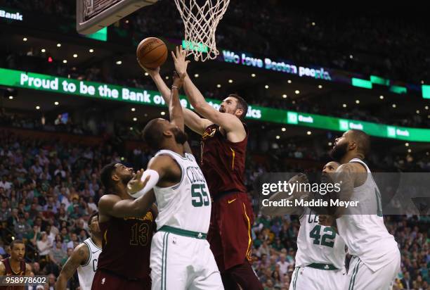 Kevin Love of the Cleveland Cavaliers shoots the ball against Greg Monroe of the Boston Celtics in the first half during Game Two of the 2018 NBA...