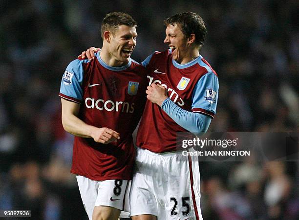 Aston Villa's James Milner celebrates scoring his second goal against Blackburn Rovers with Aston Villa's Stephen Warnock during the league cup semi...