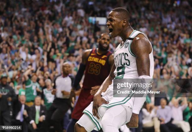 Terry Rozier of the Boston Celtics reacts after dunking the ball in the second half against the Cleveland Cavaliers during Game Two of the 2018 NBA...