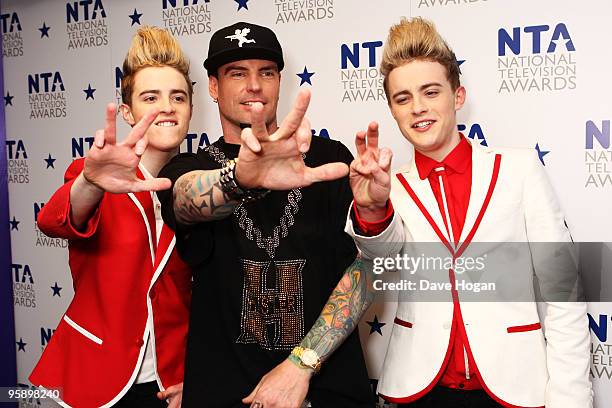 John Grimes, Vanilla Ice and Edward Grimes pose in the press room at the National Television Awards held the at The O2 Arena on January 20, 2010 in...