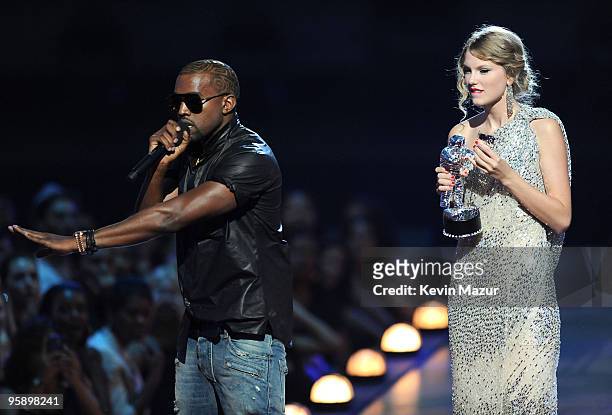 Kanye West takes the microphone from Taylor Swift and speaks onstage during the 2009 MTV Video Music Awards at Radio City Music Hall on September 13,...