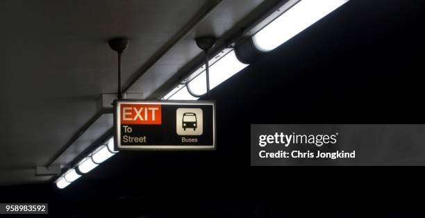 exit and bus sign - ttc stock pictures, royalty-free photos & images