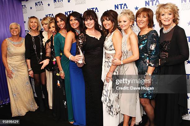 The cast of Loose Women pose with their award for most popular factual programme in the press room at the National Television Awards held the at The...