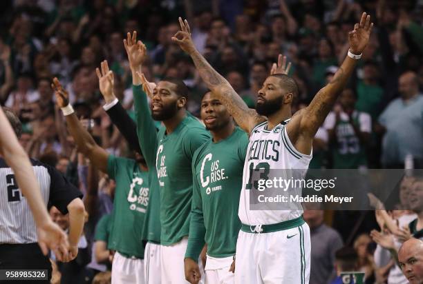 Marcus Morris of the Boston Celtics reacts with teammates on the sideline in the second half against the Cleveland Cavaliers during Game Two of the...