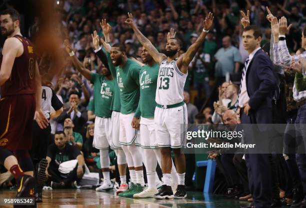 Marcus Morris of the Boston Celtics reacts with teammates on the sideline in the second half against the Cleveland Cavaliers during Game Two of the...