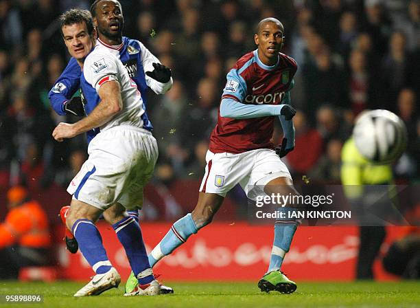 Aston Villa's Ashley Young scores a goal against Blackburn Rovers during the league cup semi final second leg football match at Villa Park in...