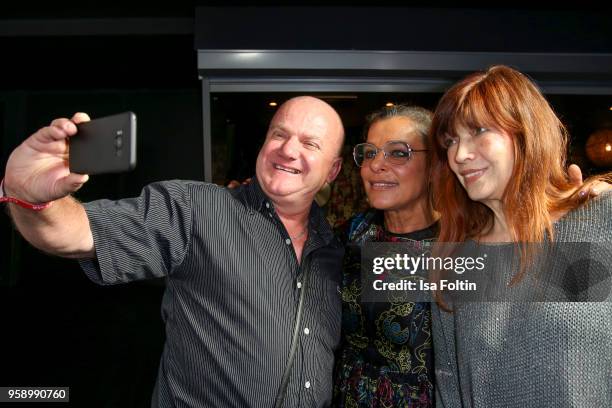 German singer-songwriter Julia Neigel and German singer Katja Ebstein with a fan during the Fred Jay Award at Columbiahalle on May 15, 2018 in...