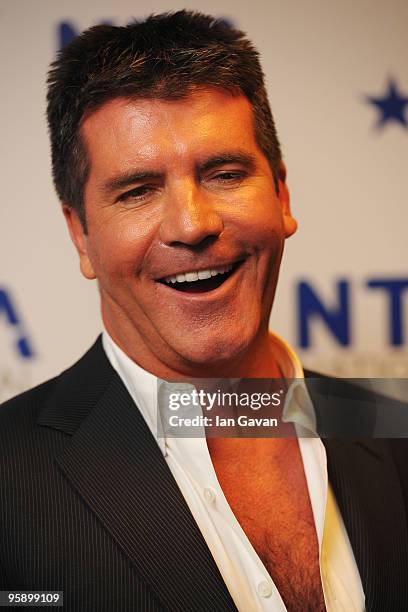 Factor judge Simon Cowell appears backstage at the National Television Awards held at O2 Arena on January 20, 2010 in London, England.