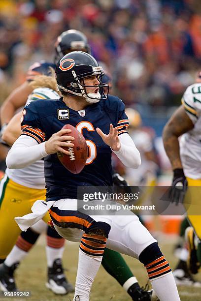 Jay Cutler of the Chicago Bears passes against the Green Bay Packers at Soldier Field on December 13, 2009 in Chicago, Illinois.