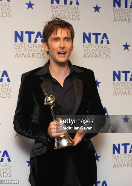 Dr Who actor David Tennant appears with his Outstanding Drama Performance award backstage at the National Television Awards held at O2 Arena on...