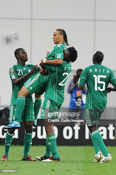 Peter Odemwingie of Nigeria celebrates his goal with team matesduring the African Nations Cup Group C match between Nigeria and Mozambique, at the...