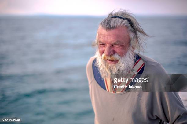 old fisherman  by the sea - blue eyed soul stock pictures, royalty-free photos & images