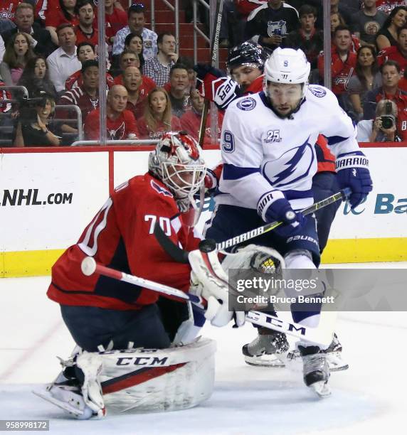 Braden Holtby of the Washington Capitals makes the save on Tyler Johnson of the Tampa Bay Lightning in Game Three of the Eastern Conference Finals...